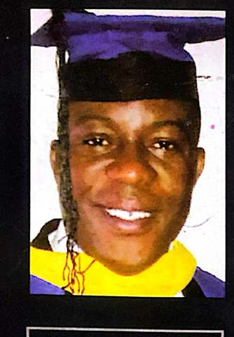 Dr. Okechukwu Akogu in graduation regalia